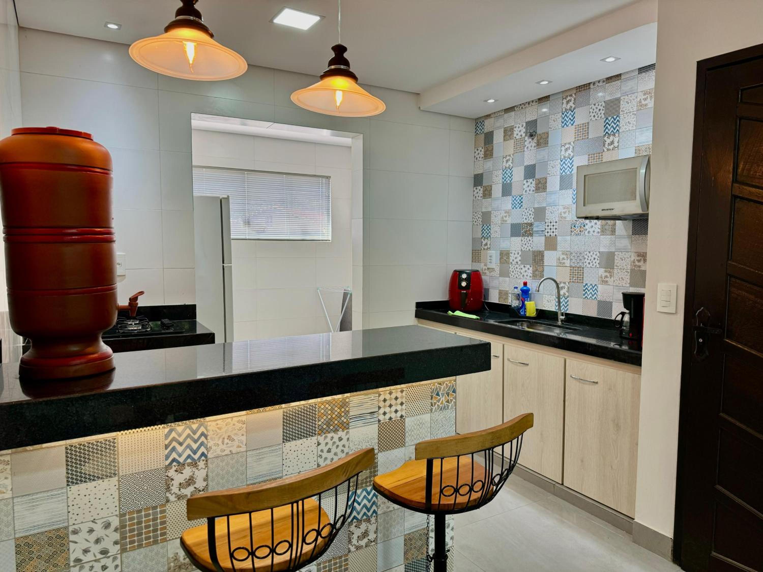 Apartamentos a 200m do centro - Hospedaria Villa da Pedra