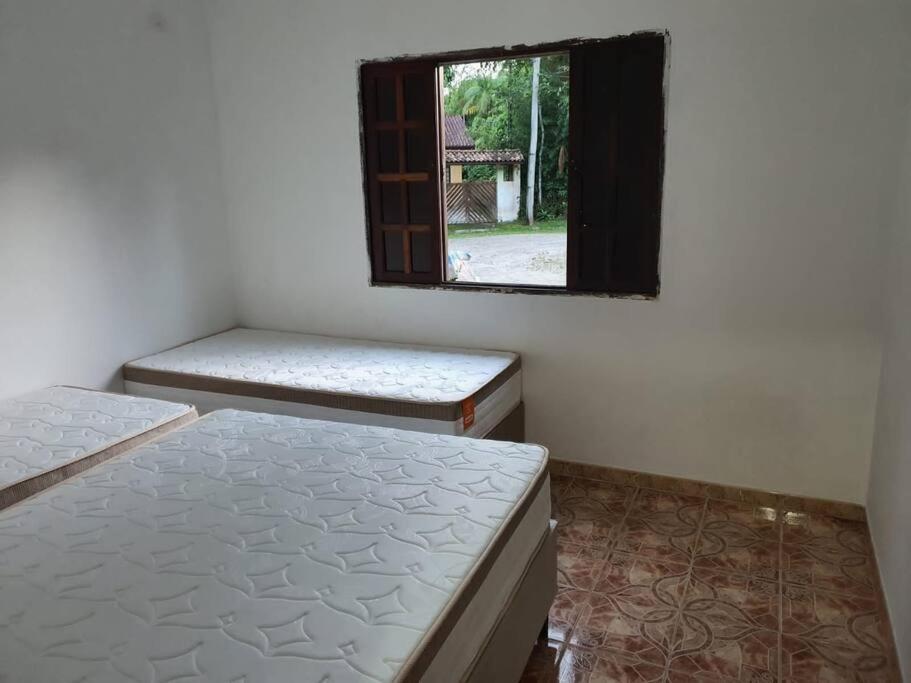 casa de praia condominio guaratuba bertioga