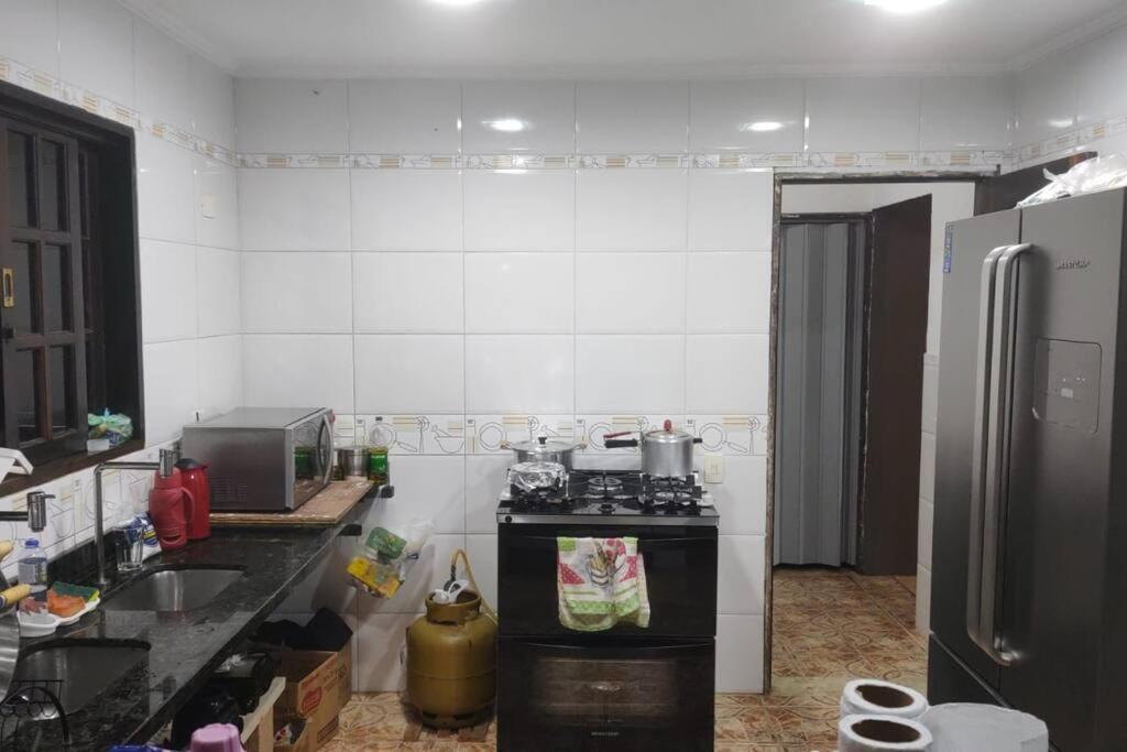 casa de praia condominio guaratuba bertioga