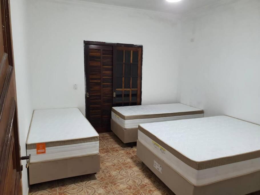 casa de praia condominio guaratuba bertioga