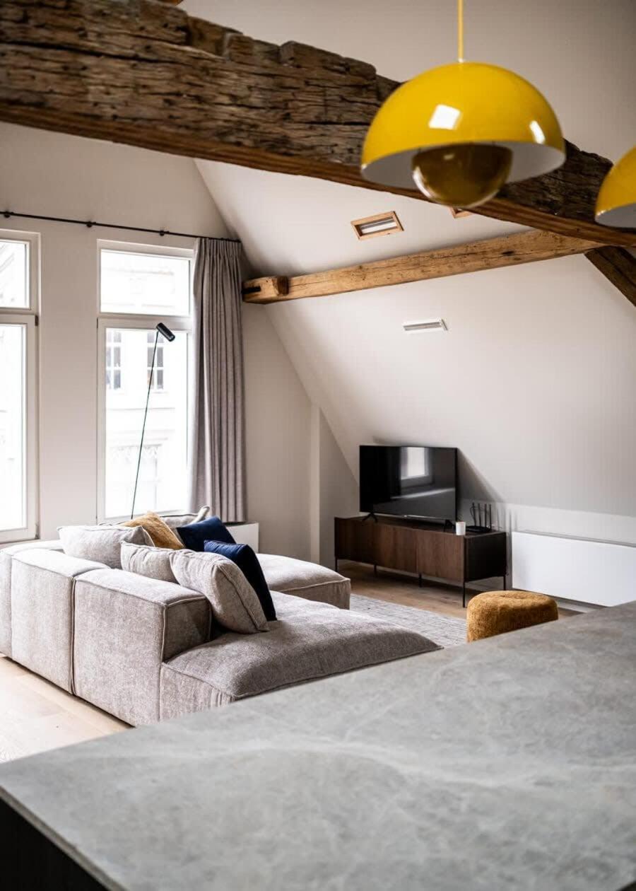 City-view loft with wooden beams and mezzanine
