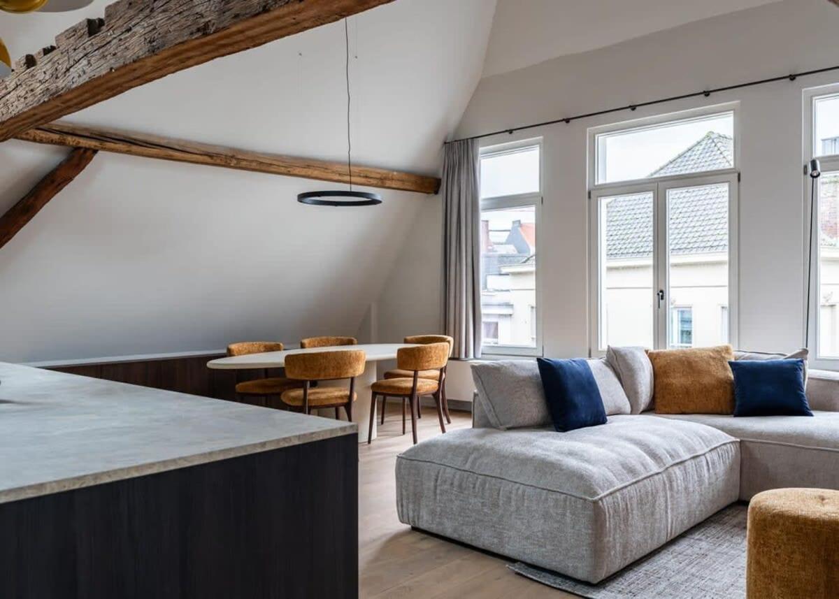 City-view loft with wooden beams and mezzanine