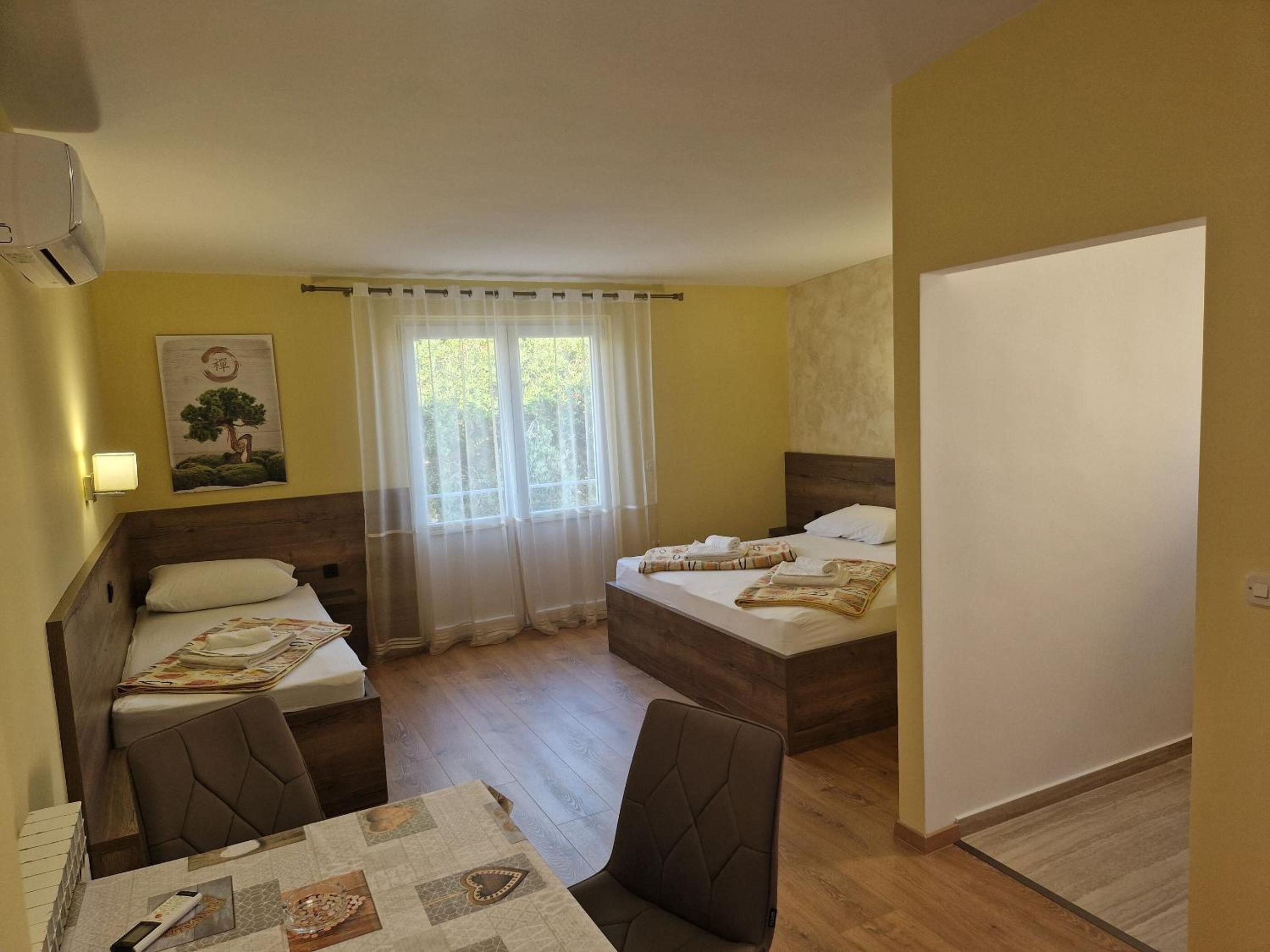 Apartment and Rooms Amenka view 4