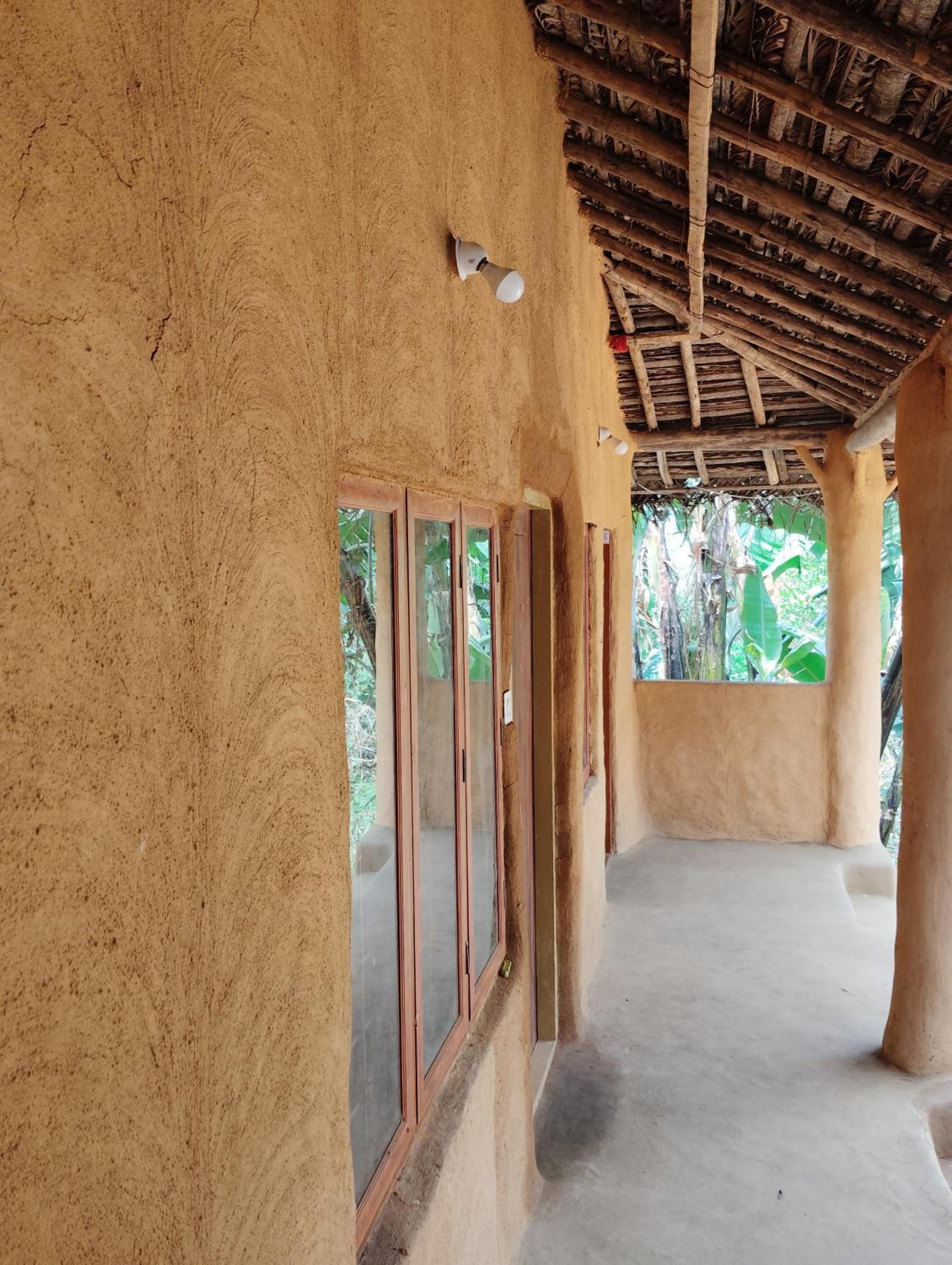 Cosmic Mud House Kanthalloor