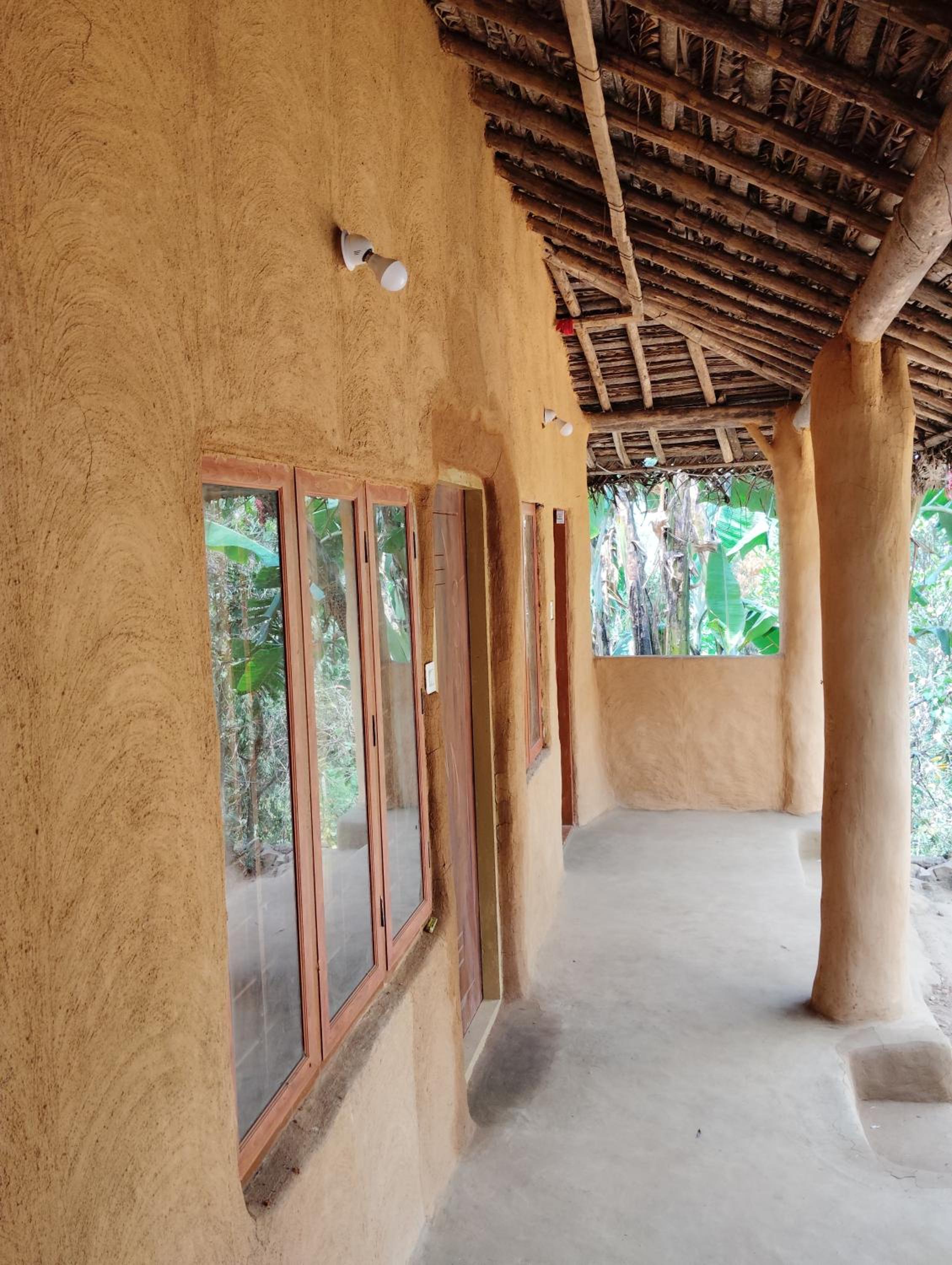 Cosmic Mud House Kanthalloor