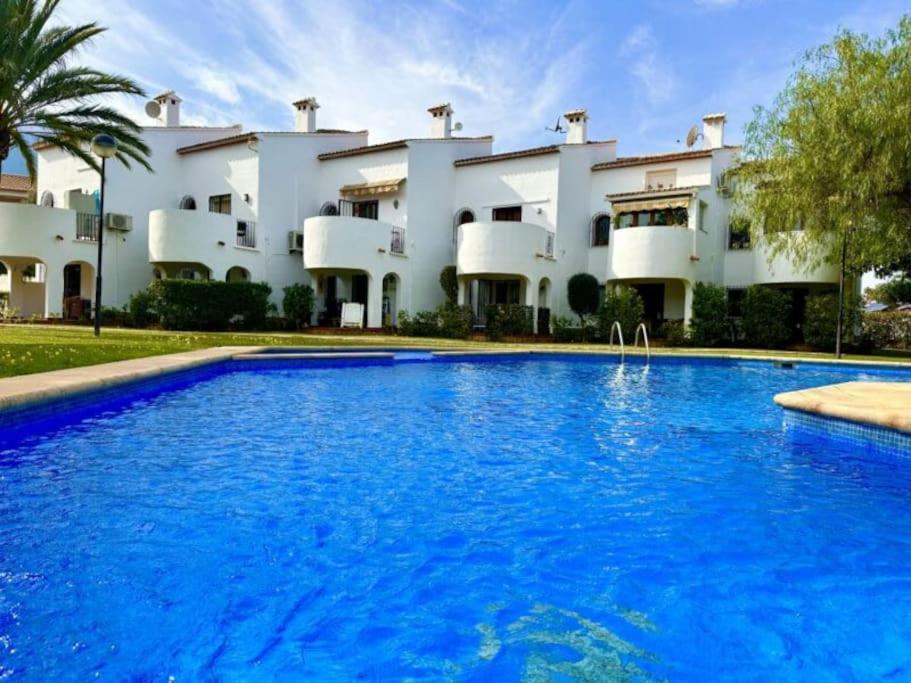 One bedroom Denia apartment with communal pool