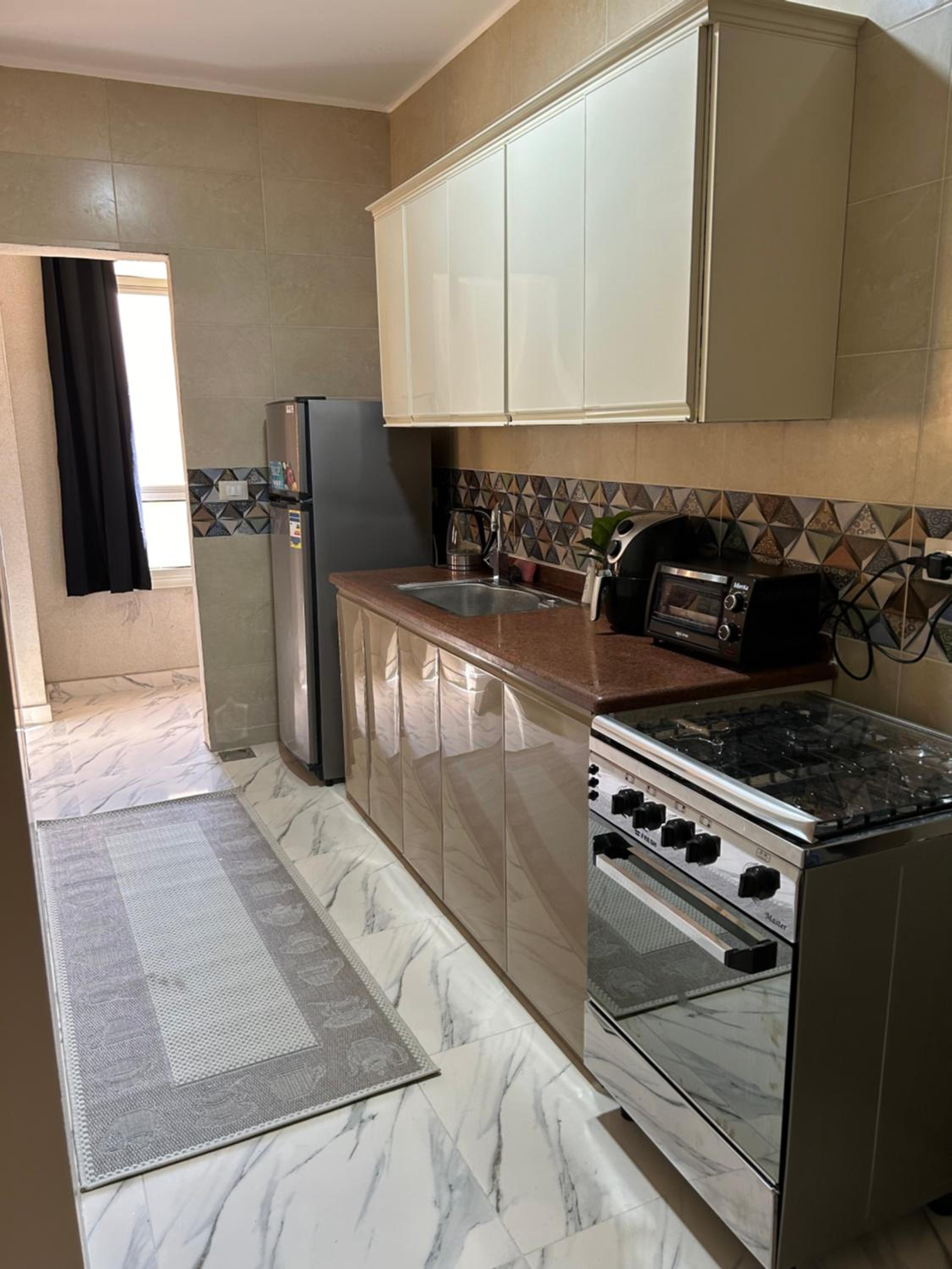 Family Apartment Near AUC