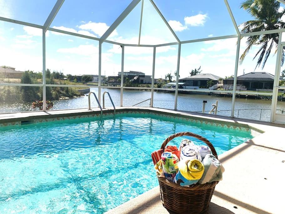 Relax with nature in our Waterfront 4 bedroom -HEATED POOL HOME-KING BED view 5