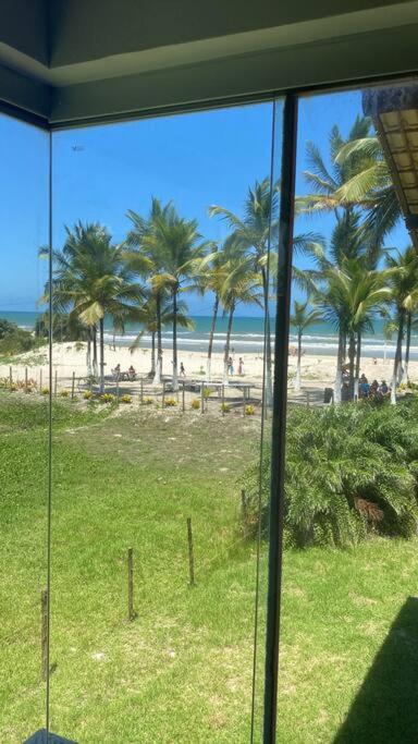 Chalé pé na areia