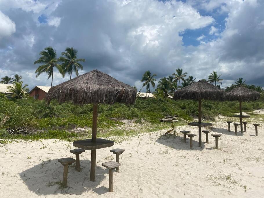 Chalé pé na areia