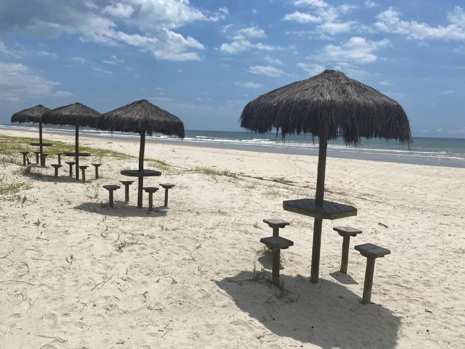 Chalé pé na areia