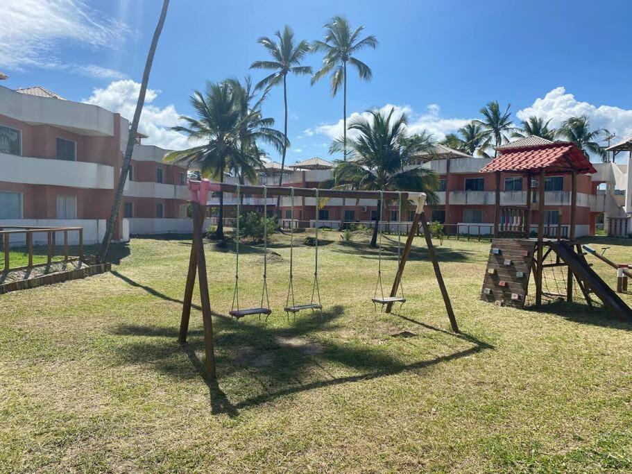 Chalé pé na areia