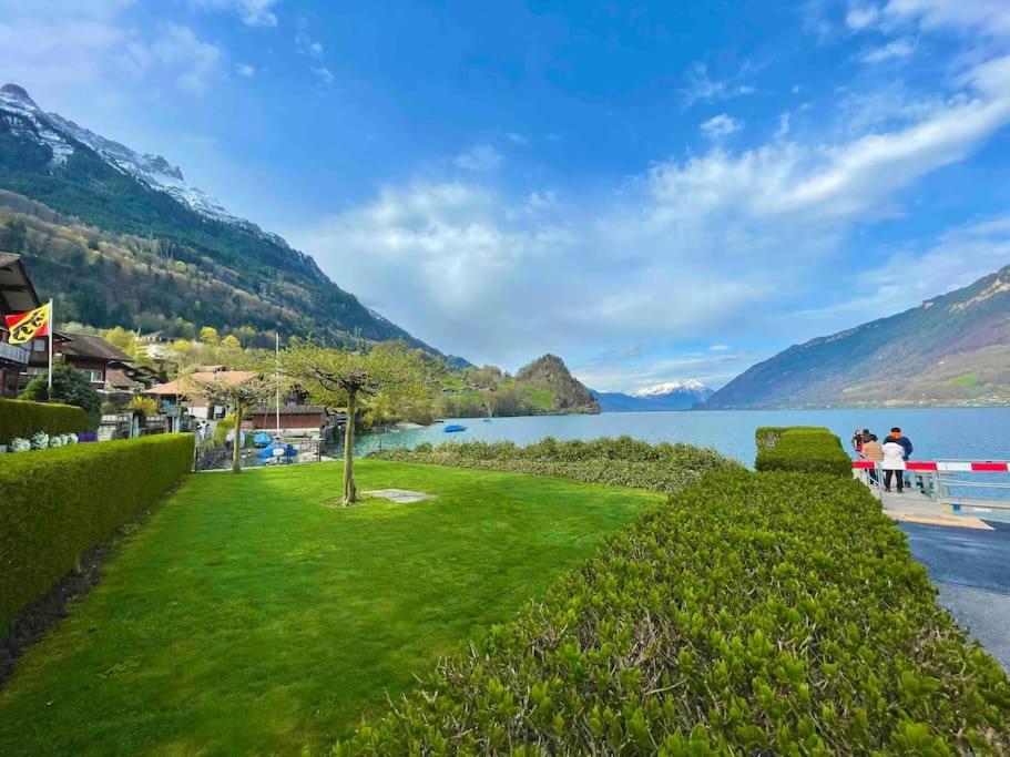 Romantic Swiss Alp Iseltwald with Lake & Mountains