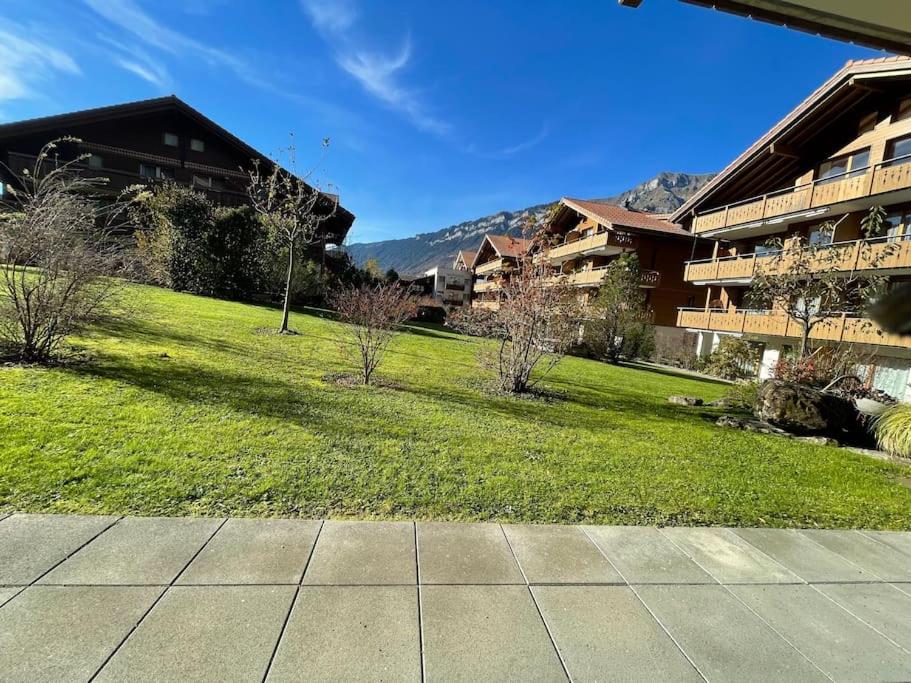 Romantic Swiss Alp Iseltwald with Lake & Mountains