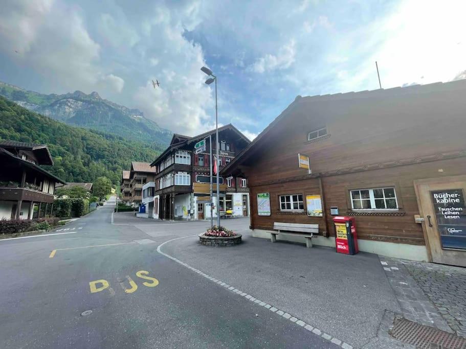 Romantic Swiss Alp Iseltwald with Lake & Mountains