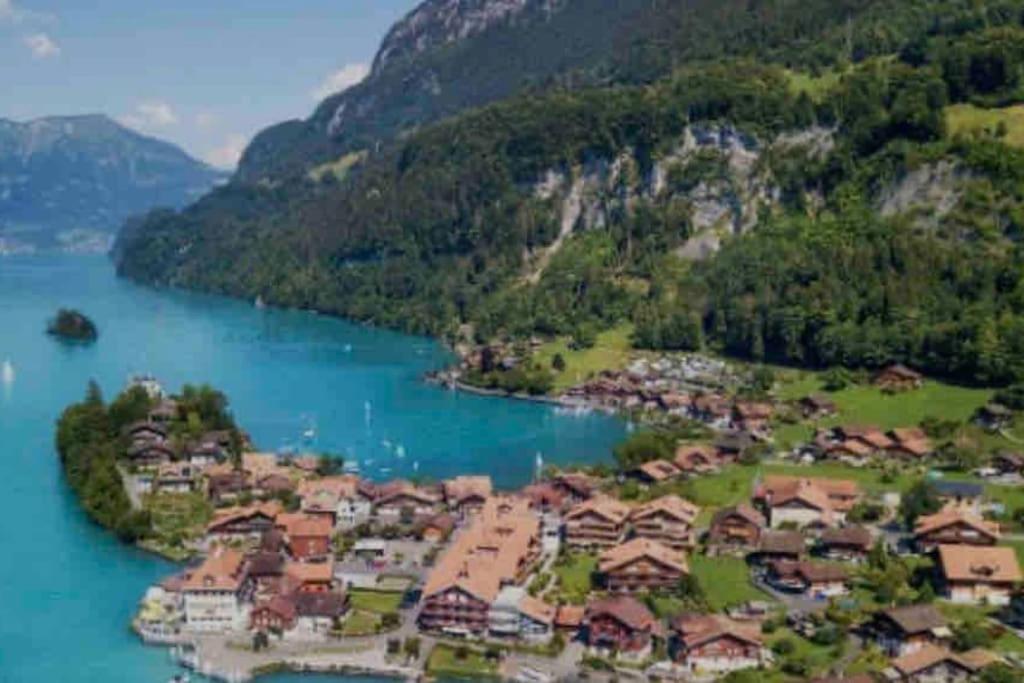 Romantic Swiss Alp Iseltwald with Lake & Mountains
