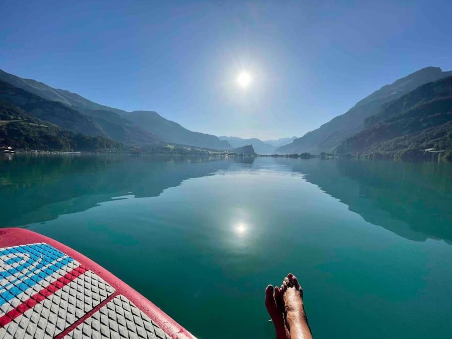 Romantic Swiss Alp Iseltwald with Lake & Mountains