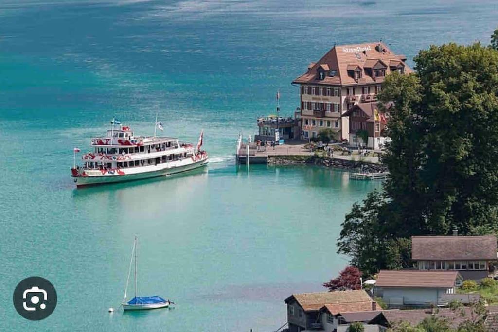 Romantic Swiss Alp Iseltwald with Lake & Mountains