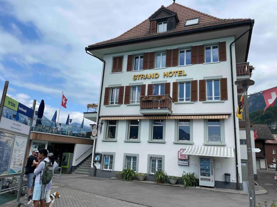 Romantic Swiss Alp Iseltwald with Lake & Mountains