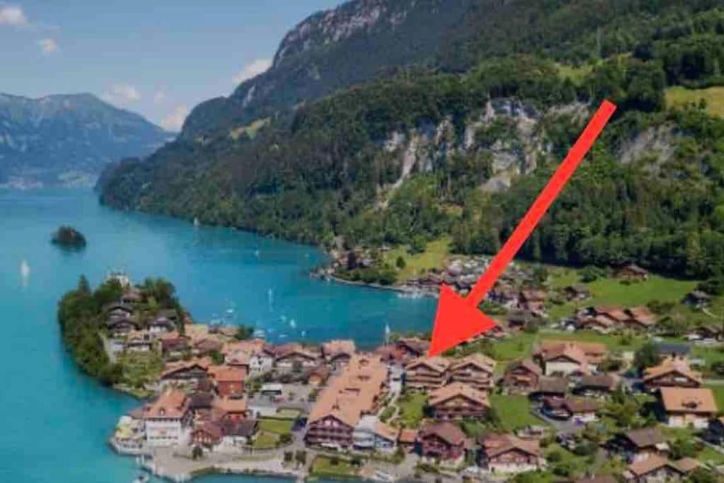 Romantic Swiss Alp Iseltwald with Lake & Mountains