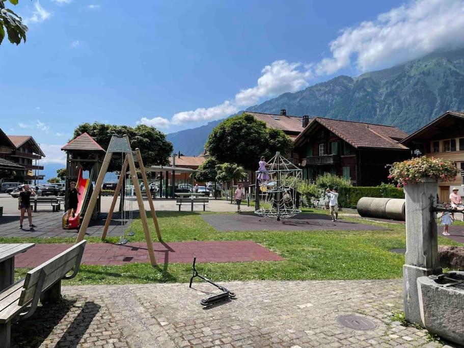 Romantic Swiss Alp Iseltwald with Lake & Mountains
