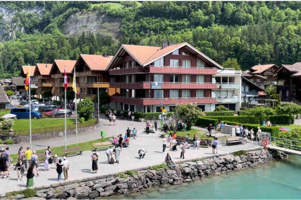 Romantic Swiss Alp Iseltwald with Lake & Mountains