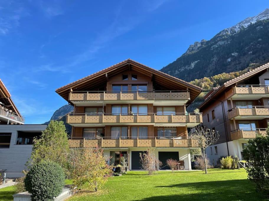 Romantic Swiss Alp Iseltwald with Lake & Mountains