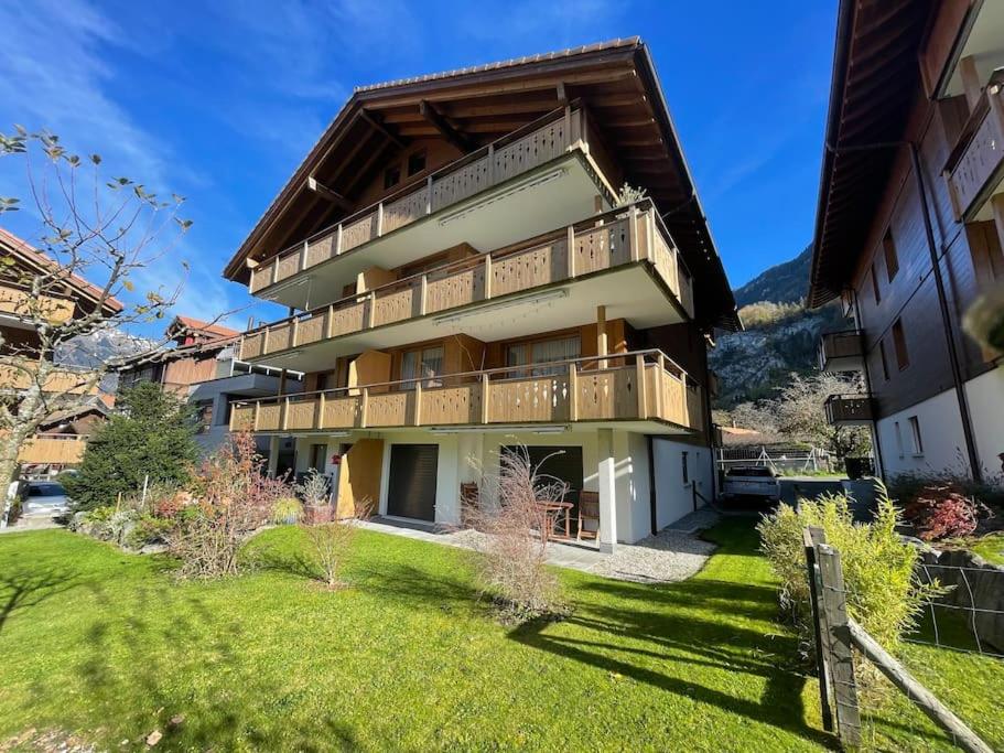 Romantic Swiss Alp Iseltwald with Lake & Mountains