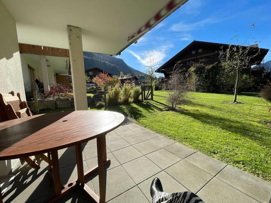Romantic Swiss Alp Iseltwald with Lake & Mountains