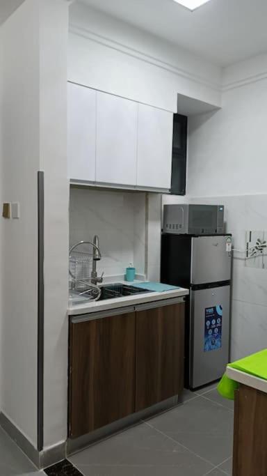Sky-high Serenity: Your Modern 1BR Retreat on the 10th Floor view 5