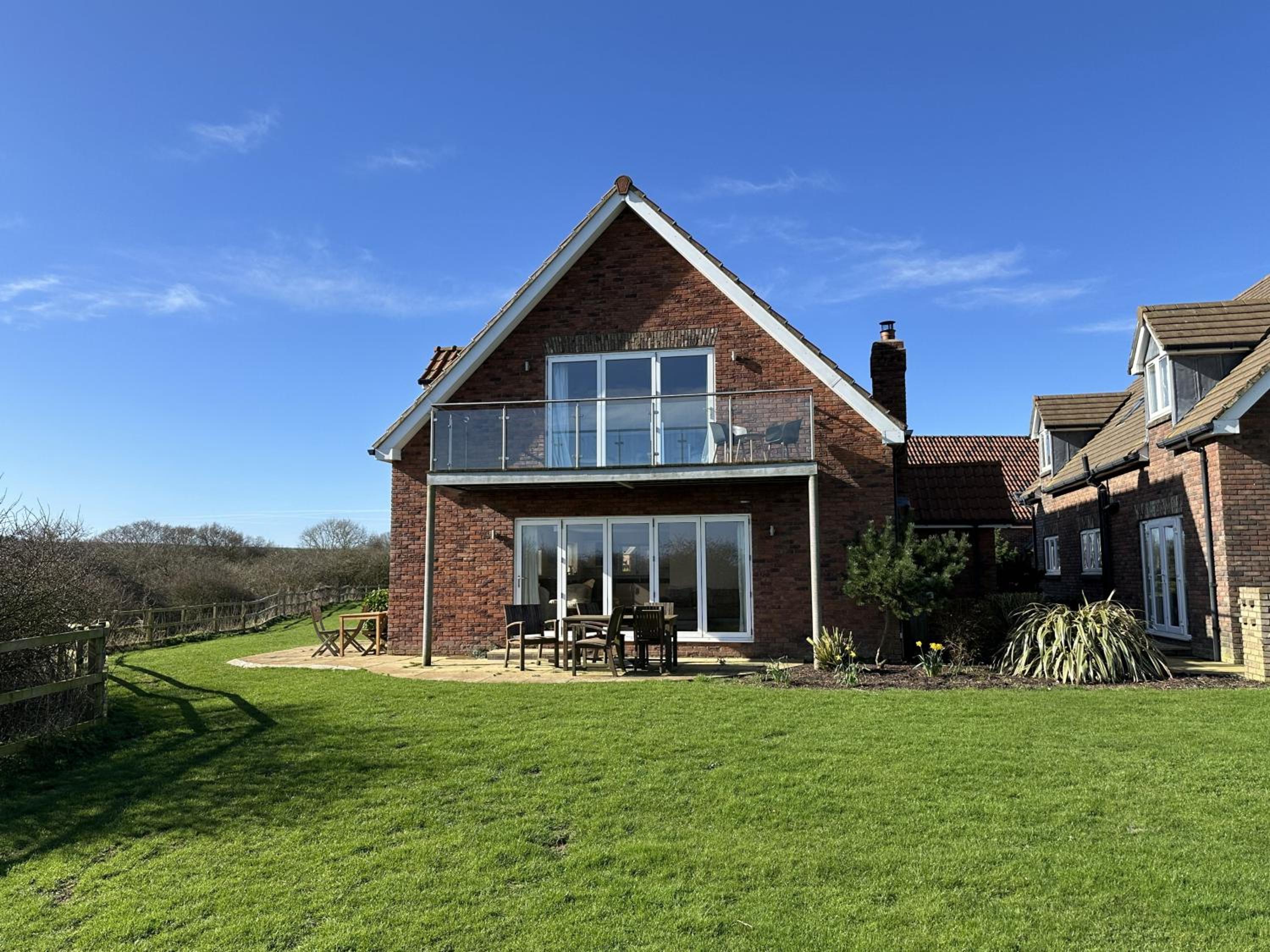 Sunrise View - Balcony and Seaview - Part of the The Bay Filey Holiday Village with pool, gym and direct beach access, pub, restaurant, tennis and meadows