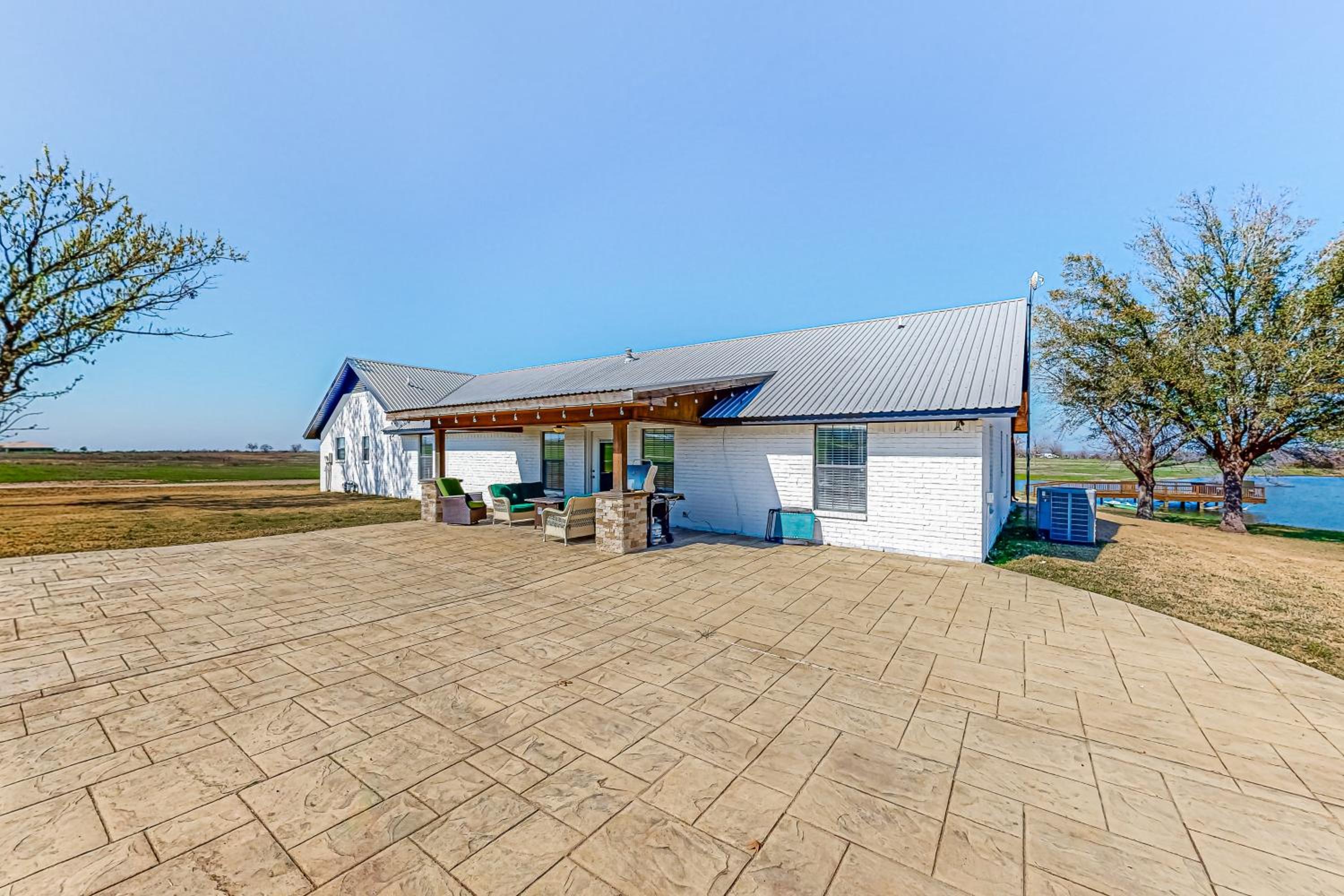 Dog-Friendly Cameron Home with Pond and Poolside Patio