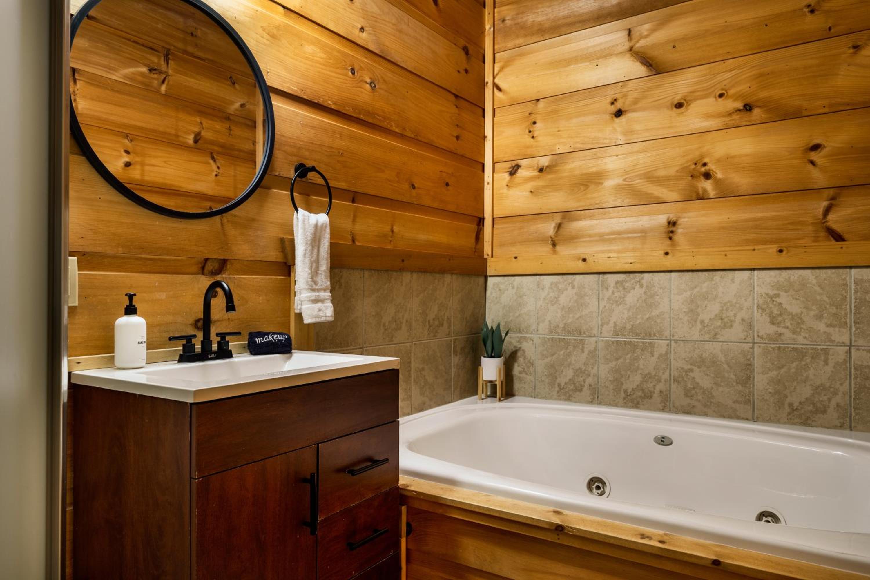 The Copper Bird Mid Century Hot tub Arcade Gameroom Rock Climbing wall