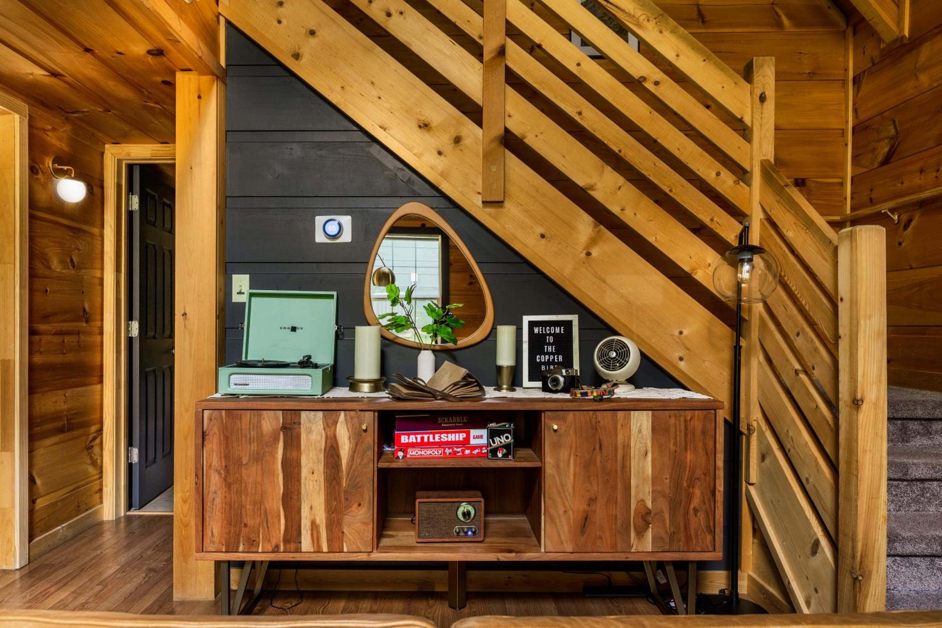 The Copper Bird Mid Century Hot tub Arcade Gameroom Rock Climbing wall