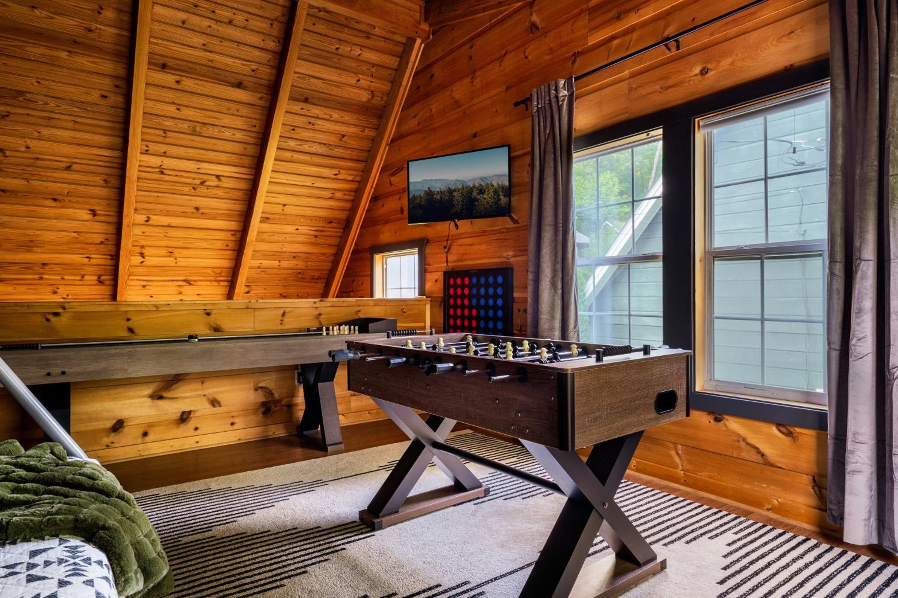 The Copper Bird Mid Century Hot tub Arcade Gameroom Rock Climbing wall