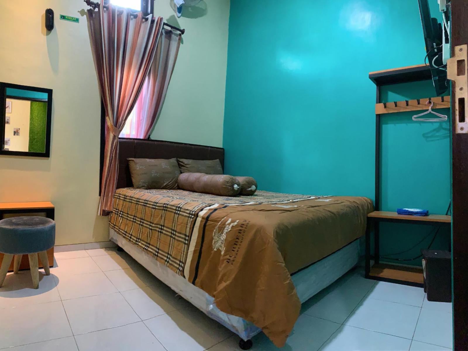 Villa Dengan Kolam Renang di Malang view 4