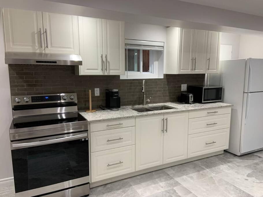 One bedroom in luxurious brand new ground level apartment
