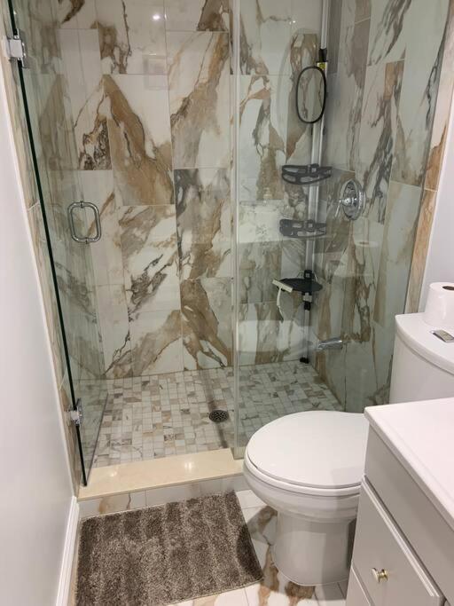 One bedroom in luxurious brand new ground level apartment