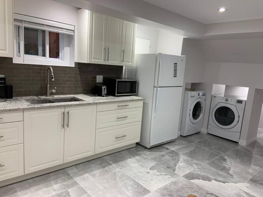 One bedroom in luxurious brand new ground level apartment