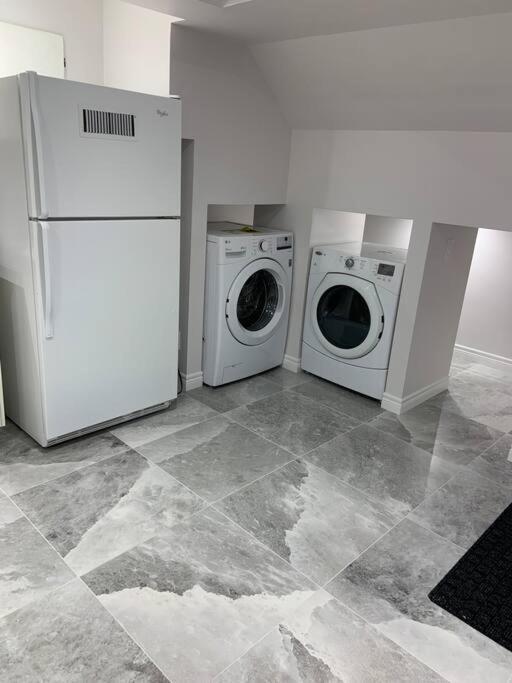 One bedroom in luxurious brand new ground level apartment