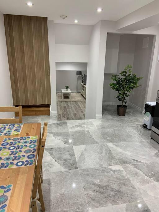 One bedroom in luxurious brand new ground level apartment