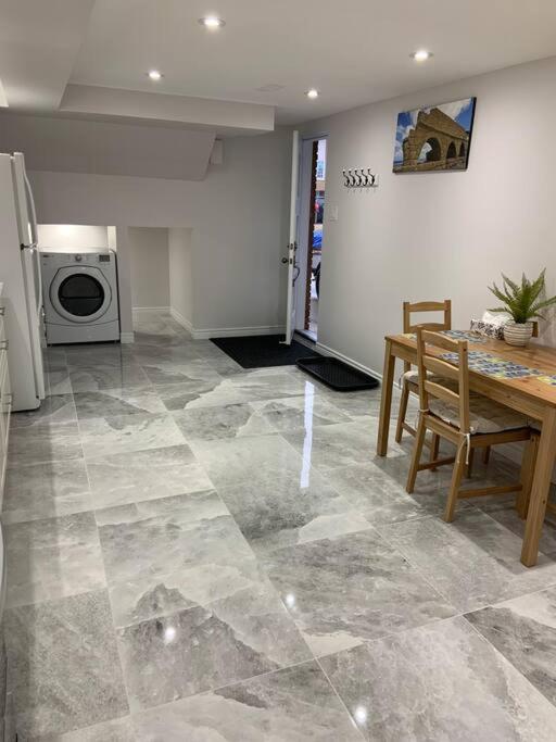 One bedroom in luxurious brand new ground level apartment