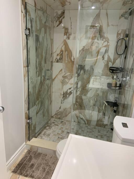 One bedroom in luxurious brand new ground level apartment