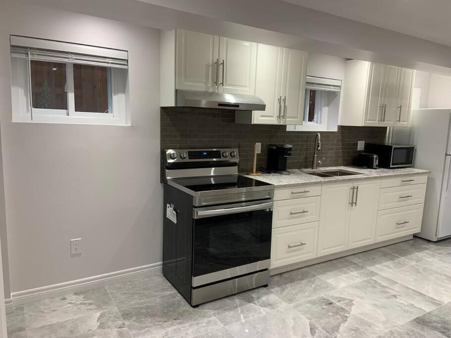 One bedroom in luxurious brand new ground level apartment