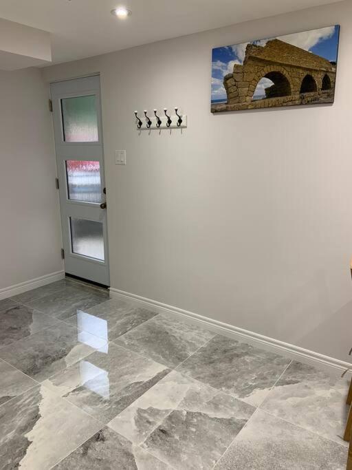 One bedroom in luxurious brand new ground level apartment