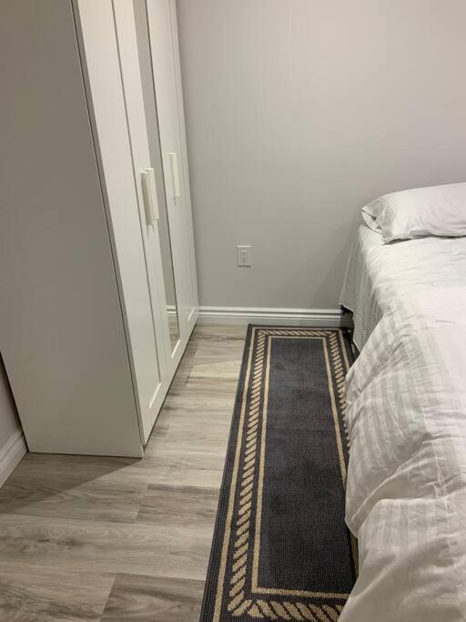 One bedroom in luxurious brand new ground level apartment