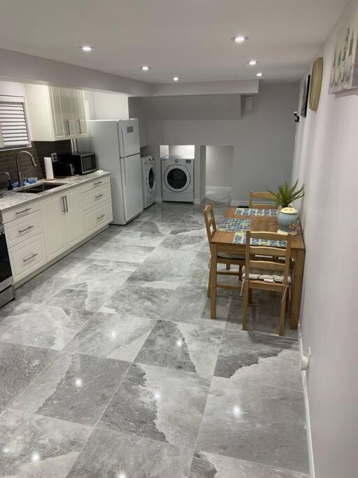 One bedroom in luxurious brand new ground level apartment