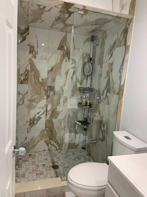 One bedroom in luxurious brand new ground level apartment