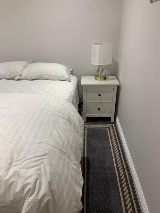 One bedroom in luxurious brand new ground level apartment