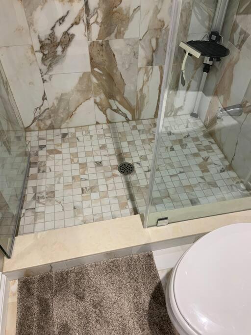 One bedroom in luxurious brand new ground level apartment